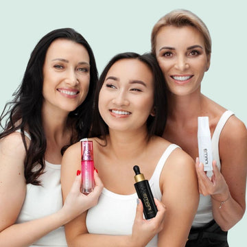 models holding vegan cosmetics by Emani